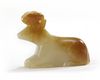 A Chinese celadon and russet jade 'deer' toggle
