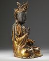 A Chinese gilt lacquered bronze figure of Guanyin