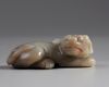 A Chinese celadon jade mythical beast