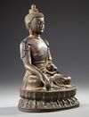 A SINO-TIBETAN BRONZE SEATED BUDDHA,  20TH CENTURY