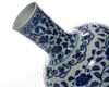 A CHINESE BLUE AND WHITE BOTTLE VASE