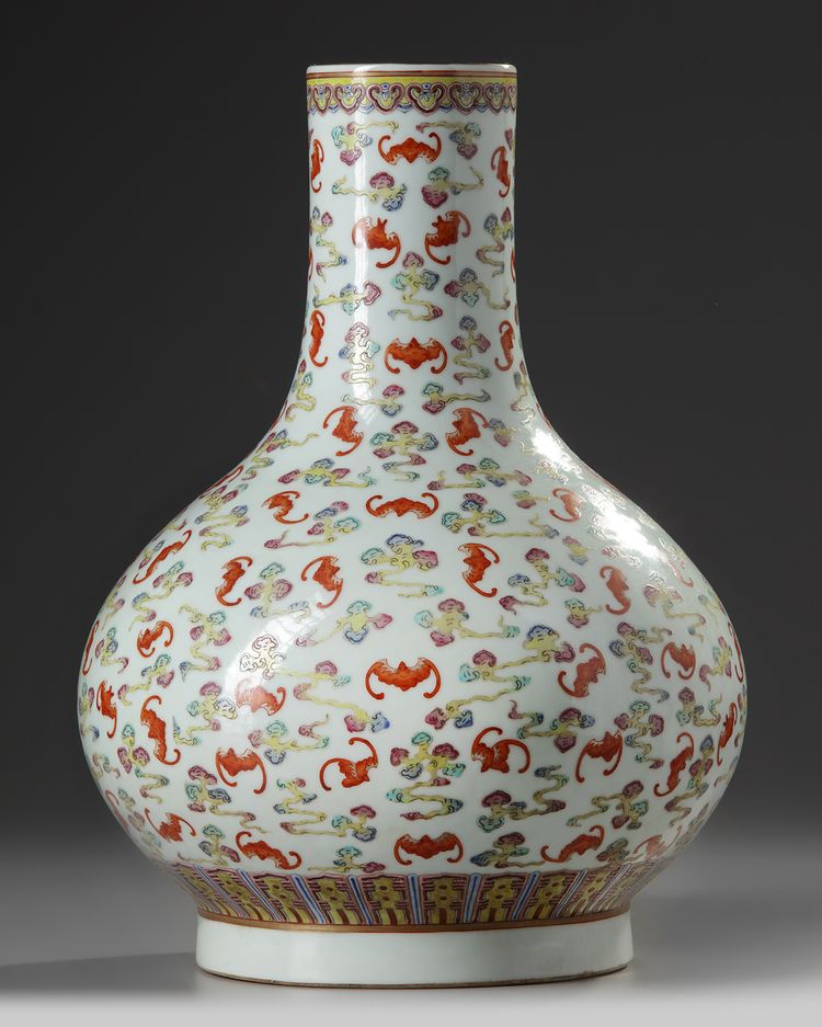 A Chinese famille rose 'bats and clouds' bottle vase