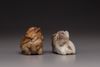 Two jade Buddhist lion carvings