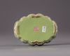 A Chinese lime-green ground famille rose foliate tray