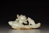 A white and russet jade 'lotus' group