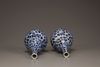 A pair of blue and white double gourd vases