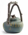 A MASSIVE CHINESE GREEN CLAY TEAPOT, 19TH-20TH CENTURY