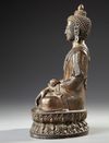 A SINO-TIBETAN BRONZE SEATED BUDDHA,  20TH CENTURY