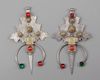 A pair of  mineral inlay fibula's