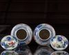 A pair of Chinese wucai glazed pots and covers