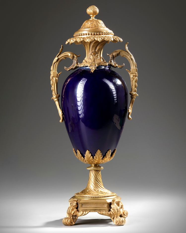 A GILT BRONZE MOUNTED SEVRES STYLE PORCELAIN VASE, 19TH CENTURY