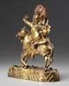 A Sino-Tibetan gilt bronze figure of Palden Lhamo