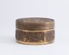A Chinese bronze 'Immortals' round box and cover