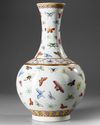 A CHINESE FAMILLE ROSE 'BUTTERFLY' BOTTLE VASE