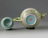 A Chinese lime-green ground famille rose teapot