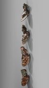 FOUR ROMAN BRONZE APPLIQUES, 1ST-2ND CENTURY AD