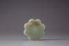 A celadon jade floral plaque