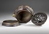 A CHINESE PARCEL-GILT BRONZE 'SEA CREATURES' CENSER, COVER AND STAND