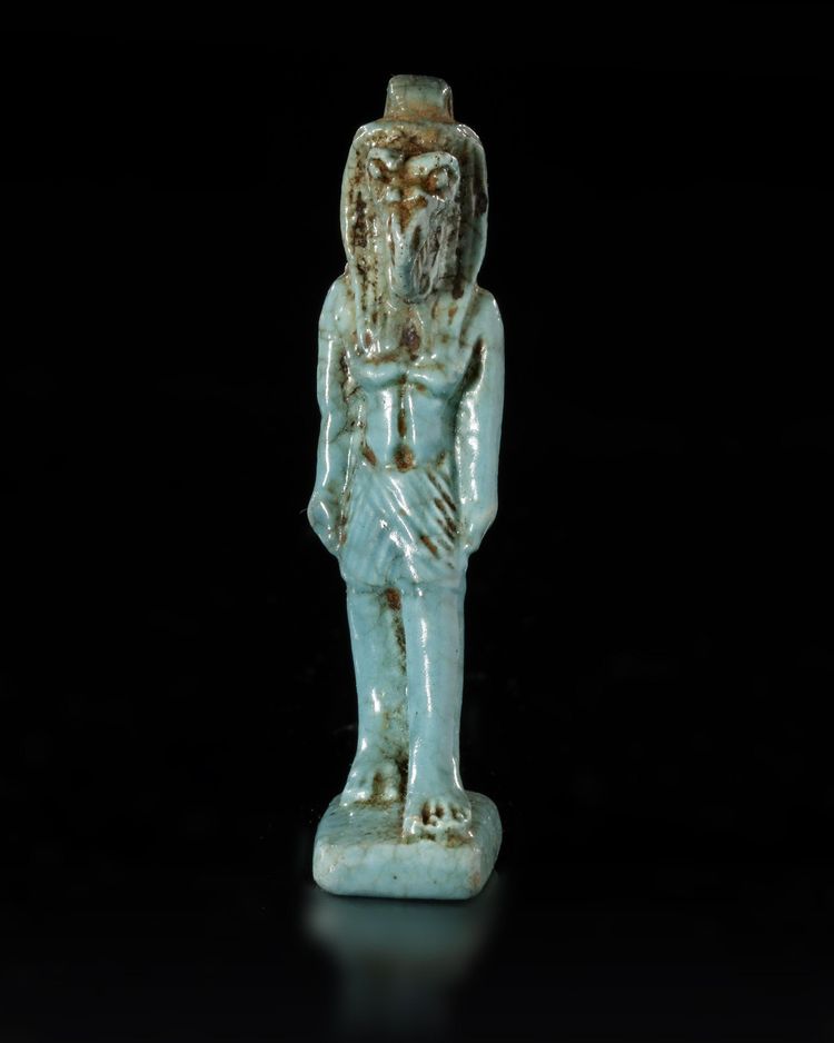 AN EGYPTIAN FAIENCE AMULET OF THOTH, LATE PERIOD, CIRCA 688-343 B.C.