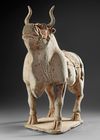 A VERY RARE LARGE OF A WALKING OX IN FULL HARNESS, CHINA, SIX DYNASTIES (220-582 AD)