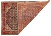A MALAYER RUG WITH MAHI FISH DESIGN