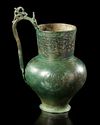 A SELJUK ENGRAVED BRONZE EWER, 12TH CENTURY
