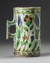 An Ottoman Iznik pottery tankard