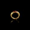 A HOLLOW ROMAN GOLD RING WITH A GARNET INTAGLIO OF AN EAGLE'S HEAD, 1ST CENTURY AD