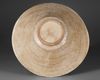 A LARGE SAMANID SLIP-PAINTED CALLIGRAPHIC POTTERY BOWL, NISHAPUR OR SAMARKAND 10TH CENTURY