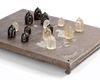 AN EXTREMELY RARE CHESS BOARD MADE OF SOLID SILVER AND DATING TO THE FATIMID PERIOD 909-1170 AD AND INSCRIBED WITH A POEM BY ‘UMARA AL-YAMANI’