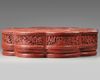 A LARGE CHINESE CINNABAR LACQUER FLORIFORM BOX AND COVER, QING DYNASTY (1644-1911)