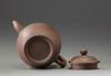 A Chinese Yixing teapot and cover