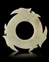A LIGHT CELADON CHINESE JADE XUANJI, SHANG DYNASTY (c. 1600–1046 BC)