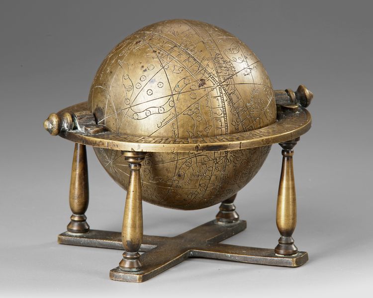 AN INDO-PERSIAN BRASS EASTERN ISLAMIC CELESTIAL GLOBE, 19TH CENTURY