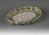 An inscribed and dated lime-green ground famille rose tea tray