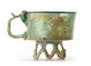 AN APPLIED GLASS FOOTED CUP, PERSIA, 9TH CENTURY