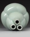A Chinese celadon-glazed triple-gourd vase