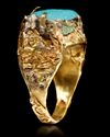 A TURQUOISE SEAL GOLD RING