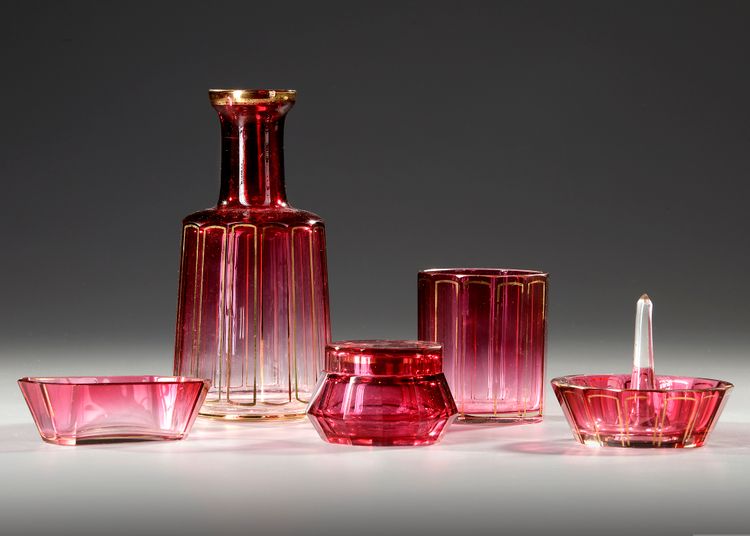 A TOILETSET OF CRANBERRY BACCARAT, CIRCA 1870
