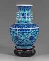 A Chinese gasoline green ground blue and white vase