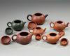 A group of six Chinese small yixing teapots
