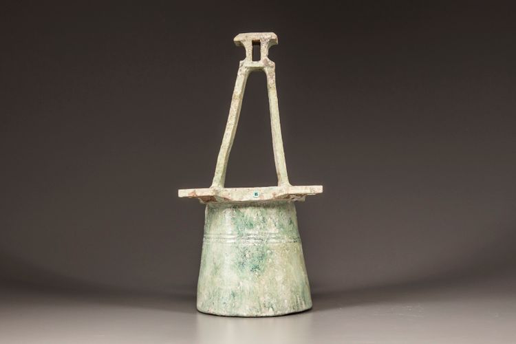 A green-glazed pottery well