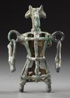 AN AMLASH OPENWORK BRONZE IDOL, CIRCA 1ST MILLENIUM B.C.