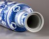 A blue and white rouleau vase