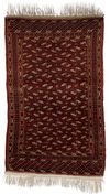 A SEMI-ANTIQUE TURKMEN YOMUD RUG
