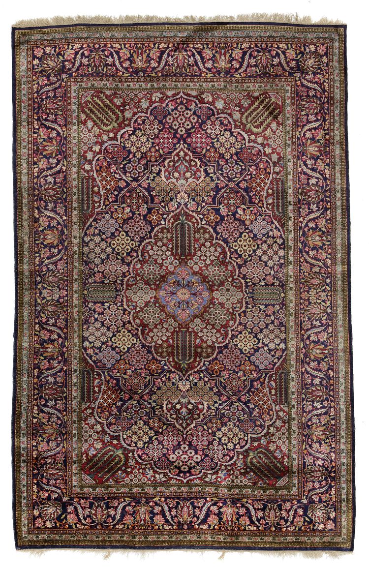 A KASHAN WOOL RUG