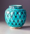 A QAJAR TURQUOISE GLAZED POTTERY JAR,  PERSIA 19TH CENTURY