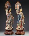 A PAIR OF CHINESE POLYCHROME PAINTED WOODEN CARVED FIGURES OF GUANYIN, EARLY 20TH CENTURY