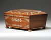 A WOODEN MOTHER-OF-PEARL INLAID BOX