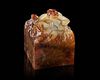 A CHINESE WHITE JADE DRAGON SEAL, HAN DYNASTY (206 BC–220 AD)